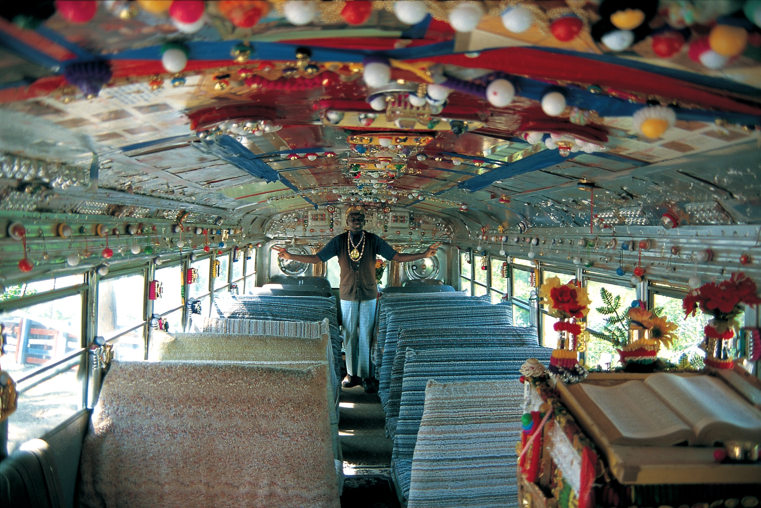 HD - Rev. Dennis preaching in rear of bus/church - Master Image