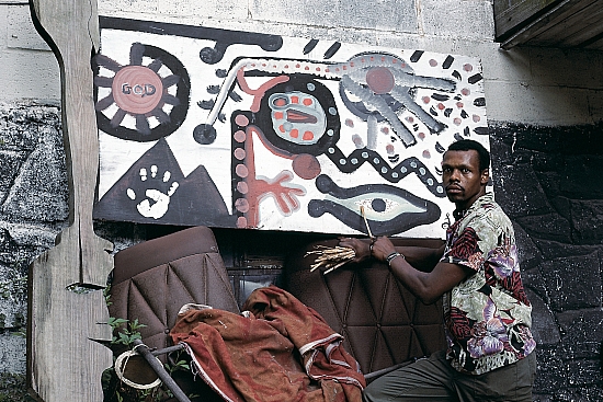 LH - Lonnie Holley with his painting The Hand of My Grandfather - Master Image